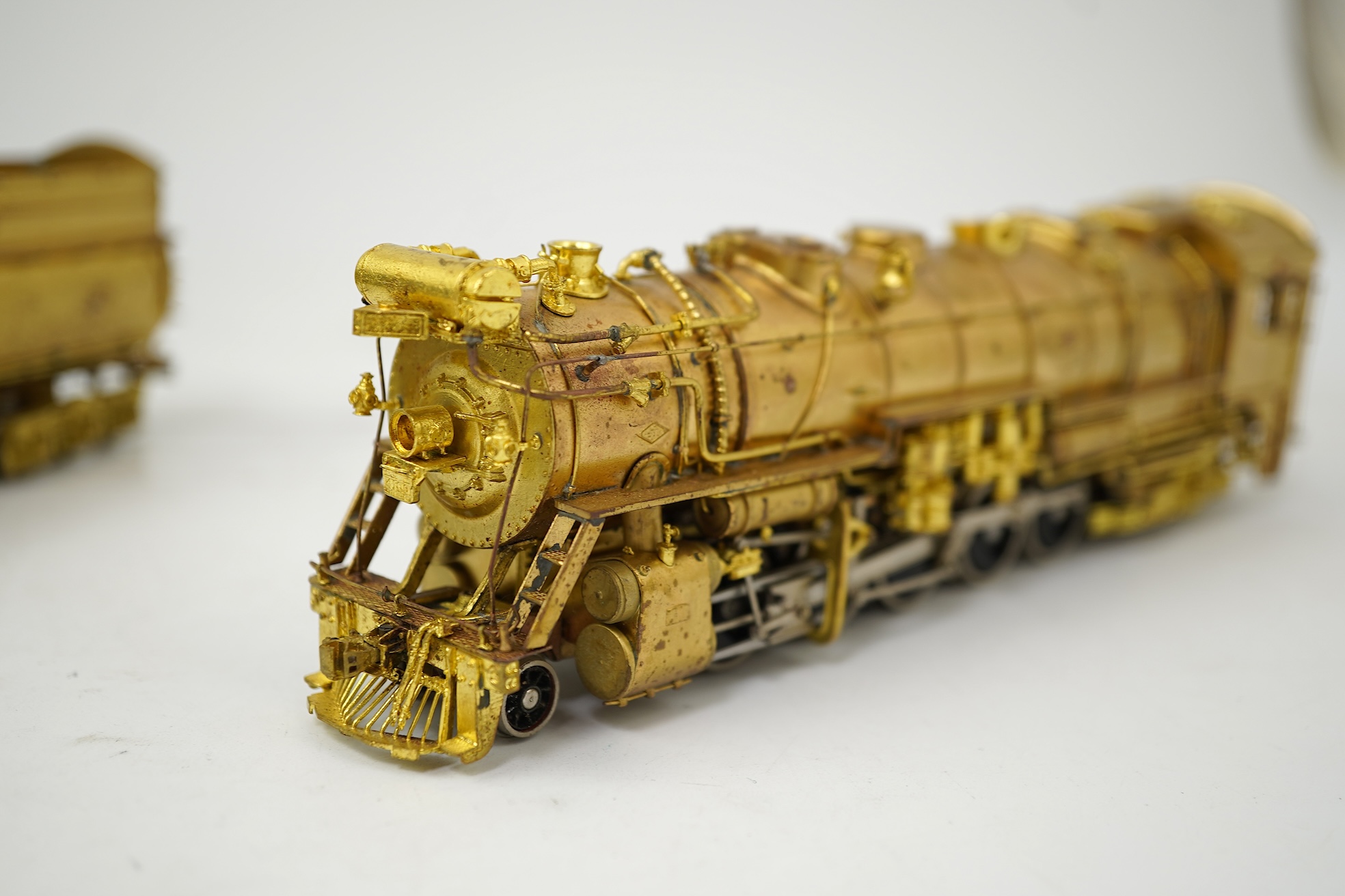 A boxed HO gauge VH Scale Models unpainted brass model of Canadian National Railways T-2a, 4100, 2-10-2 locomotive with bogie tender, powered for two rail operation.